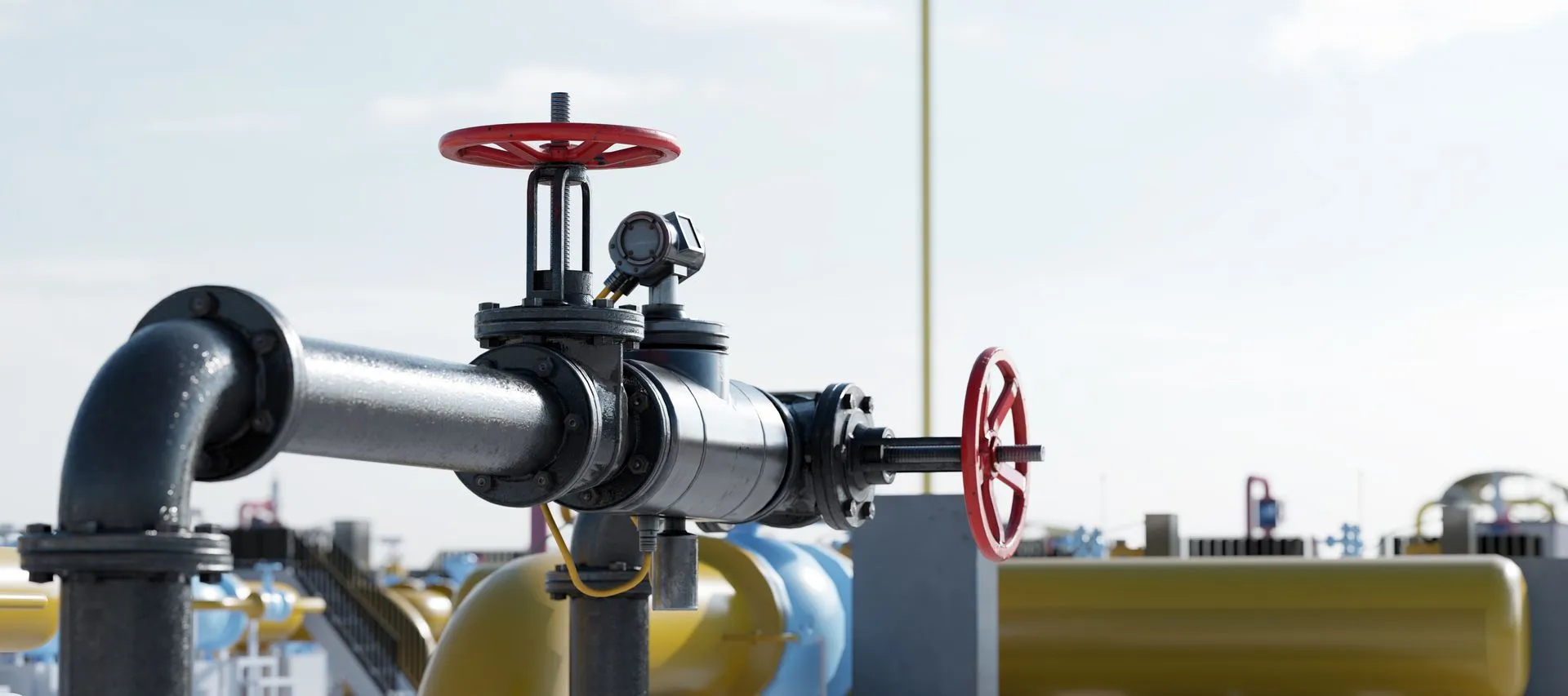 A close up of a gas pipe with a red valve on it.  Gas pipe installation in Gresham OR